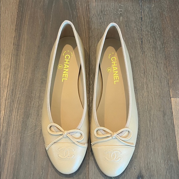 CHANEL Shoes - BRAND NEW CHANEL Tan Ballet Flats with Bow Detail